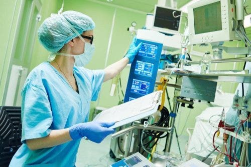 Nurse examining results