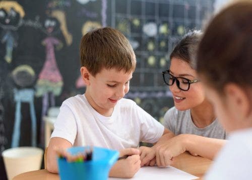 A teacher uses positive behavior support in the classroom.