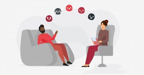 A therapist talks with a patient with an arc of different emojis over their heads.