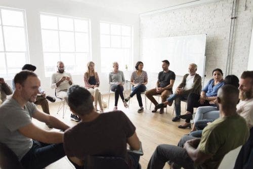 Adults at a group therapy session