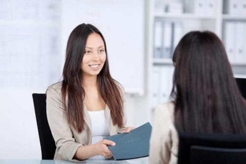 Social worker and client have a conversation.